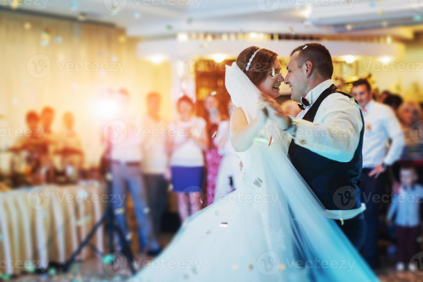 Happy bride and groom their first dance photo