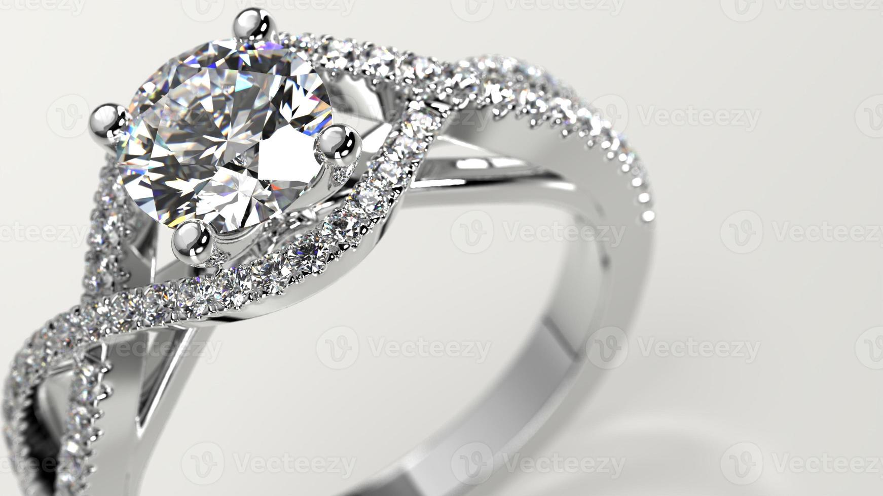 closeup shot with diamond solitaire criss cross engagement ring photo