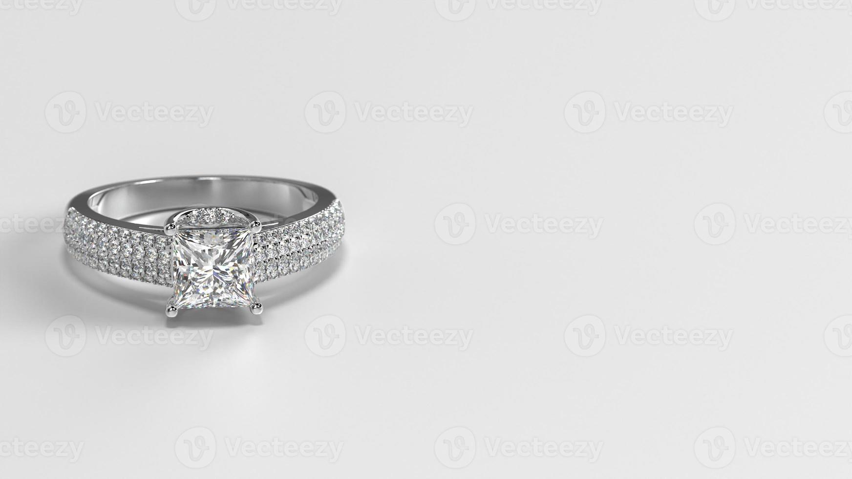 princess white gold engagement ring with side three layer stones on shank laying down front photo