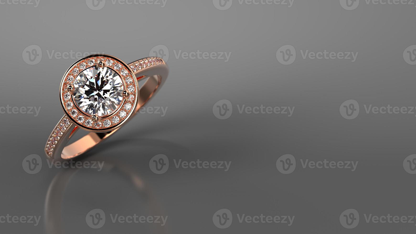anillo de compromiso con halo redondo en oro rosa con diamantes laterales foto