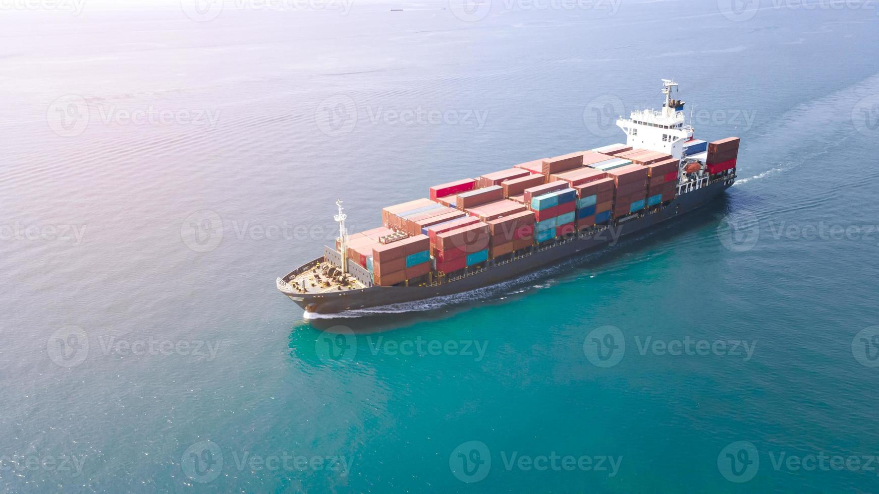 container ship on the sea to import export transport photo