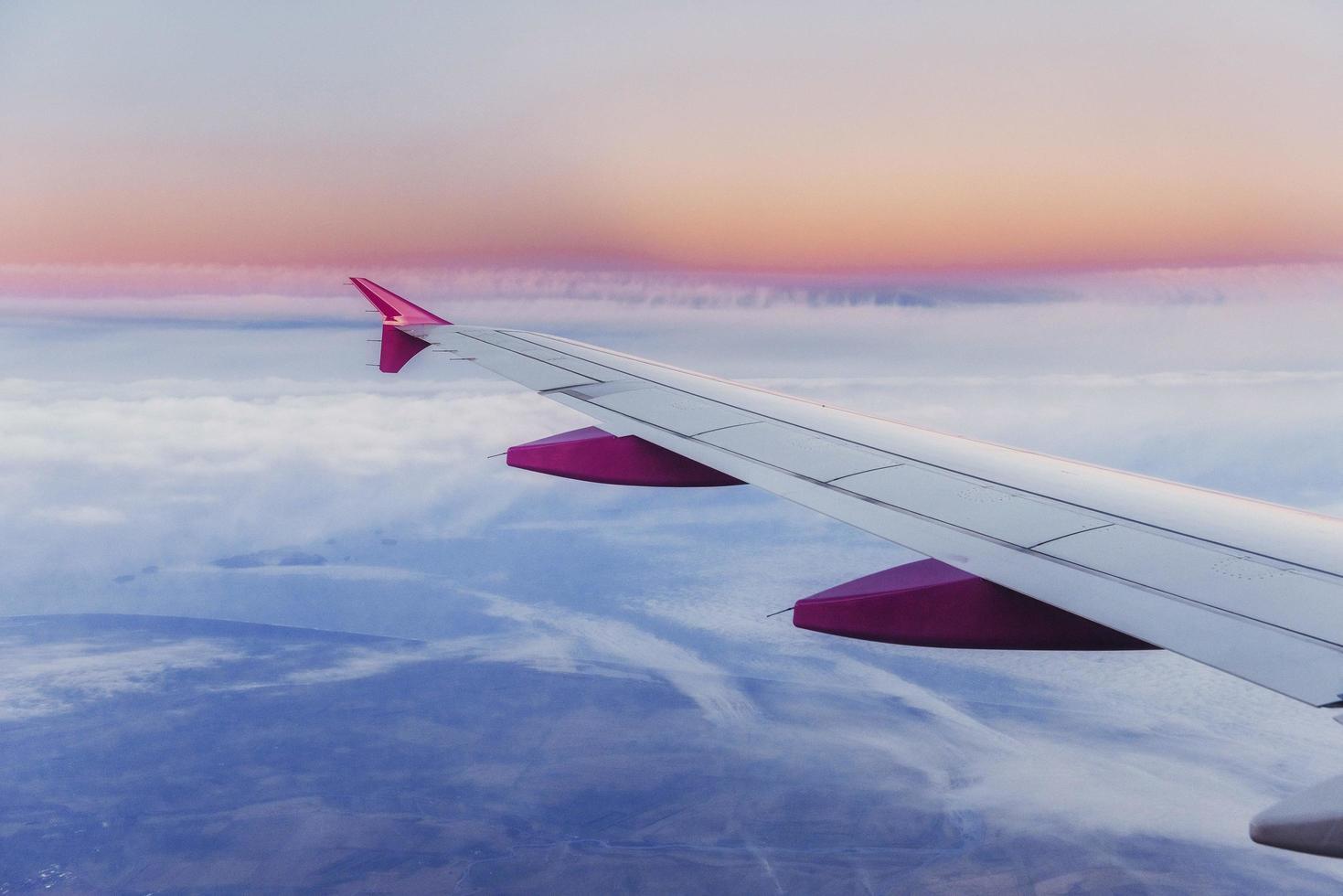 Wing aircraft and a view of cumulus clouds photo