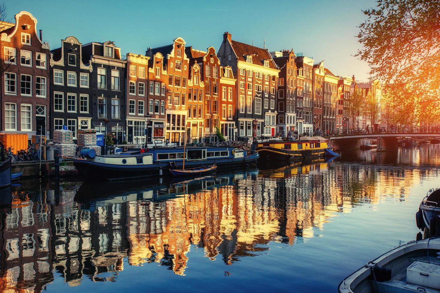 Canal at sunset. Amsterdam is the capital photo