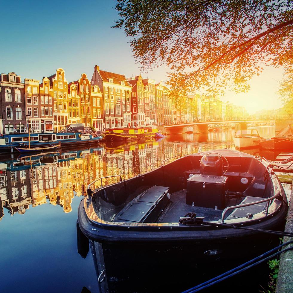 Canal at sunset. Amsterdam is the capital photo