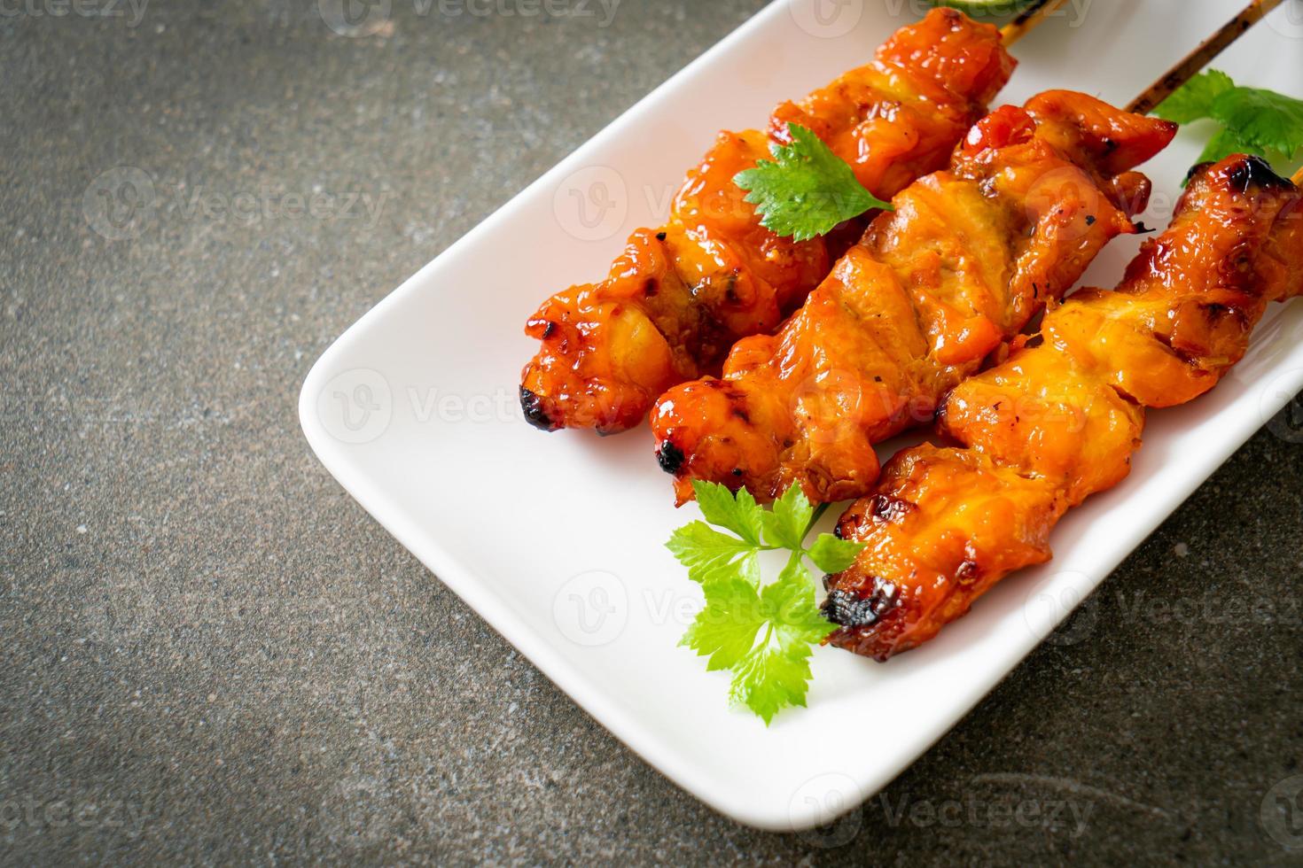 grilled chicken skewer with herbs and spices photo