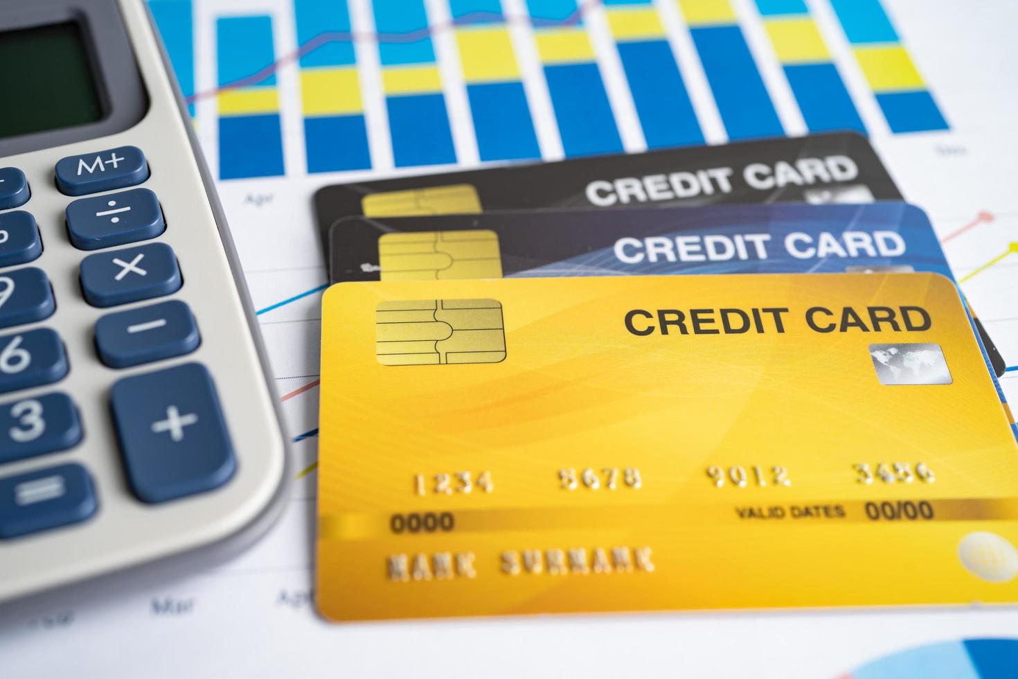 Credit card on chart and graph paper. Finance development, Banking Account, Statistics, Investment Analytic research data economy, Stock exchange trading, Business company concept. photo