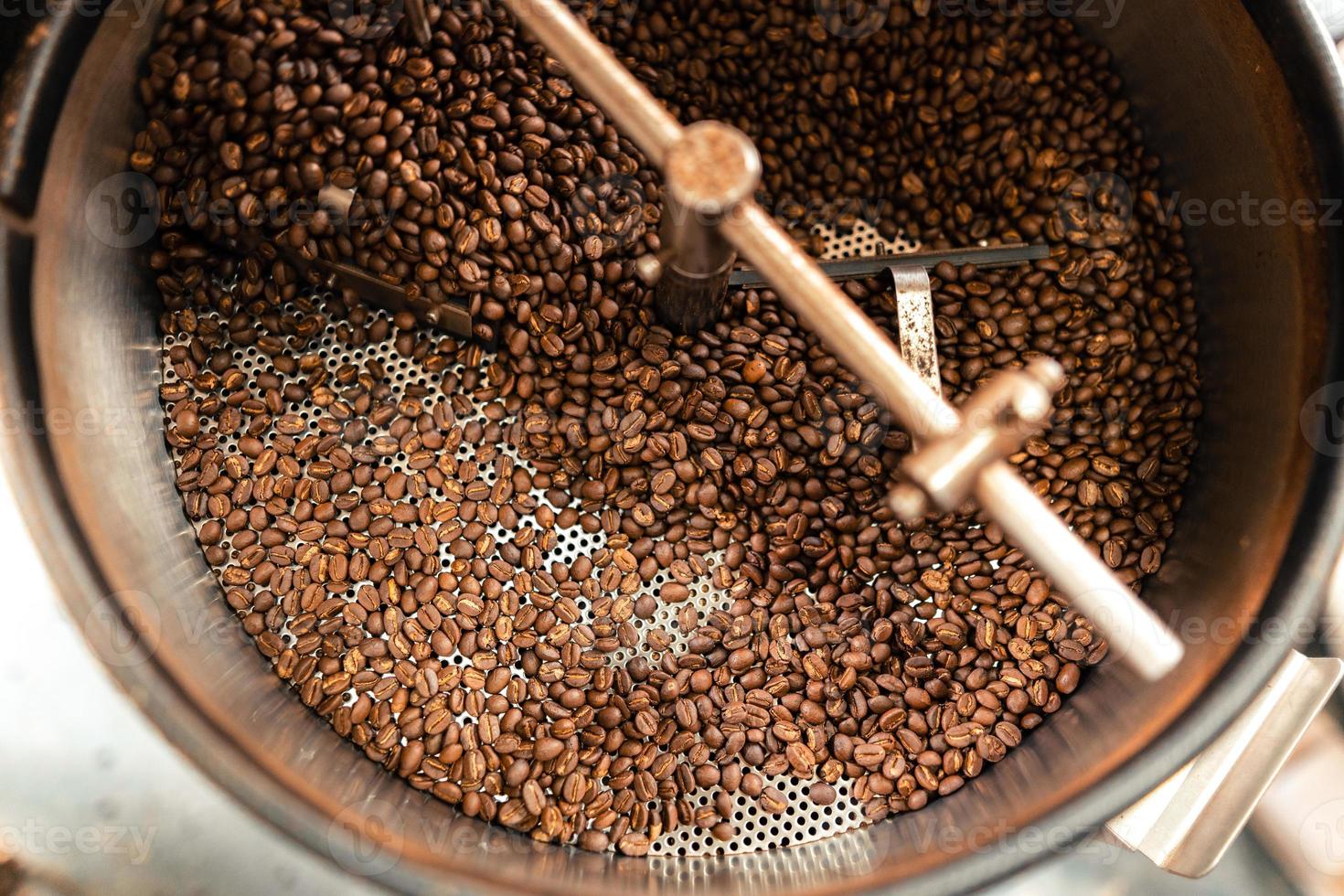 Roasted coffee beans in a cooling machine photo