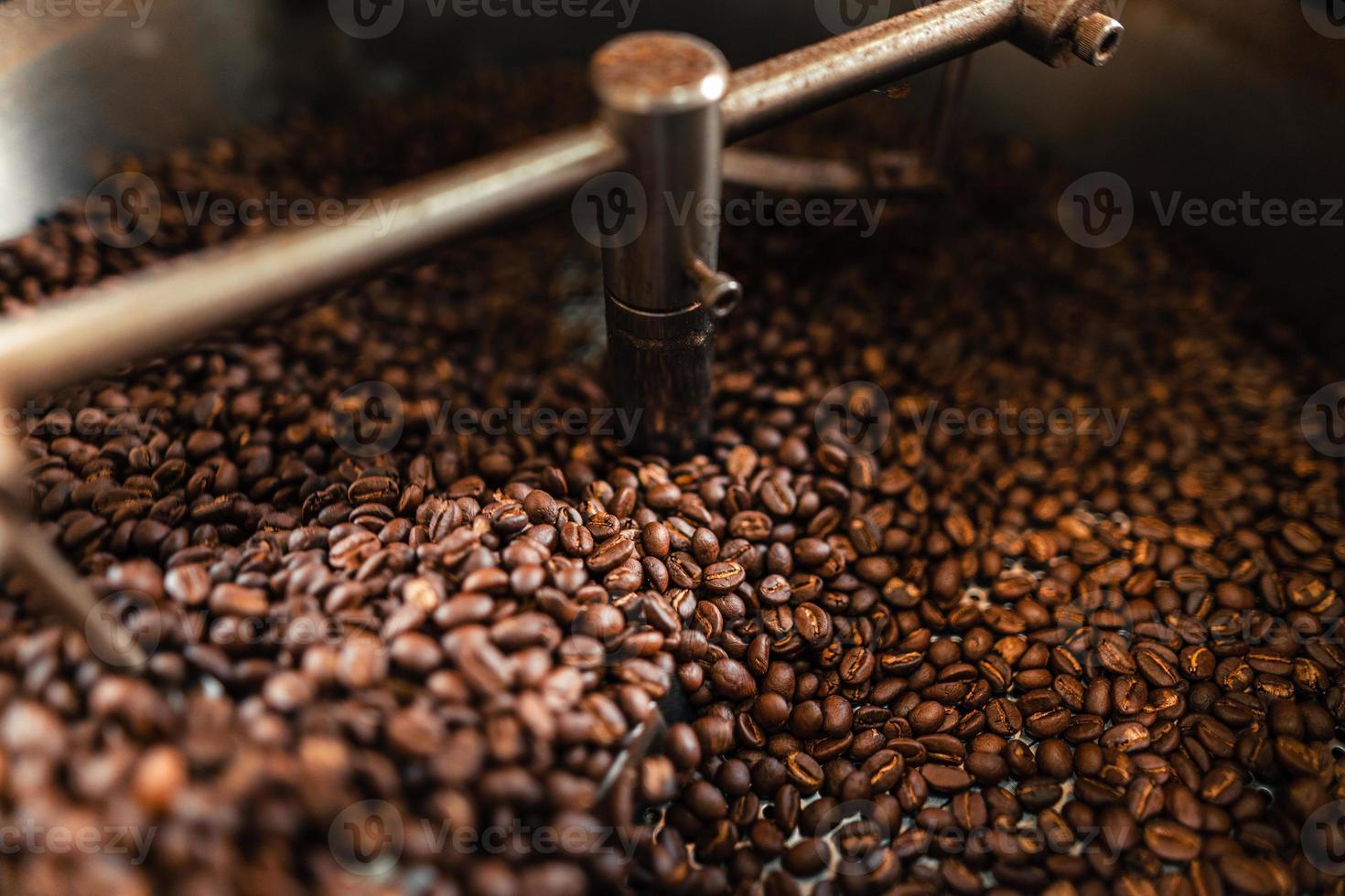 Roasted coffee beans in a cooling machine photo