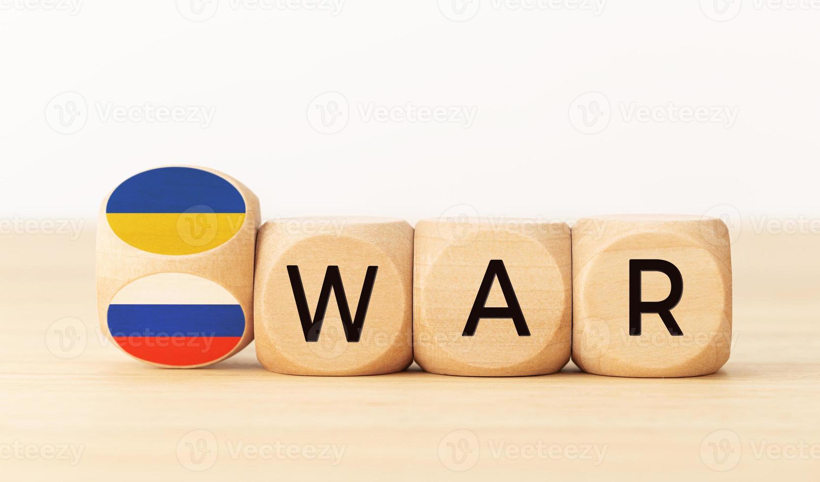 Ukraine and Russia war concept. National flag and word on wooden block. Copy space photo