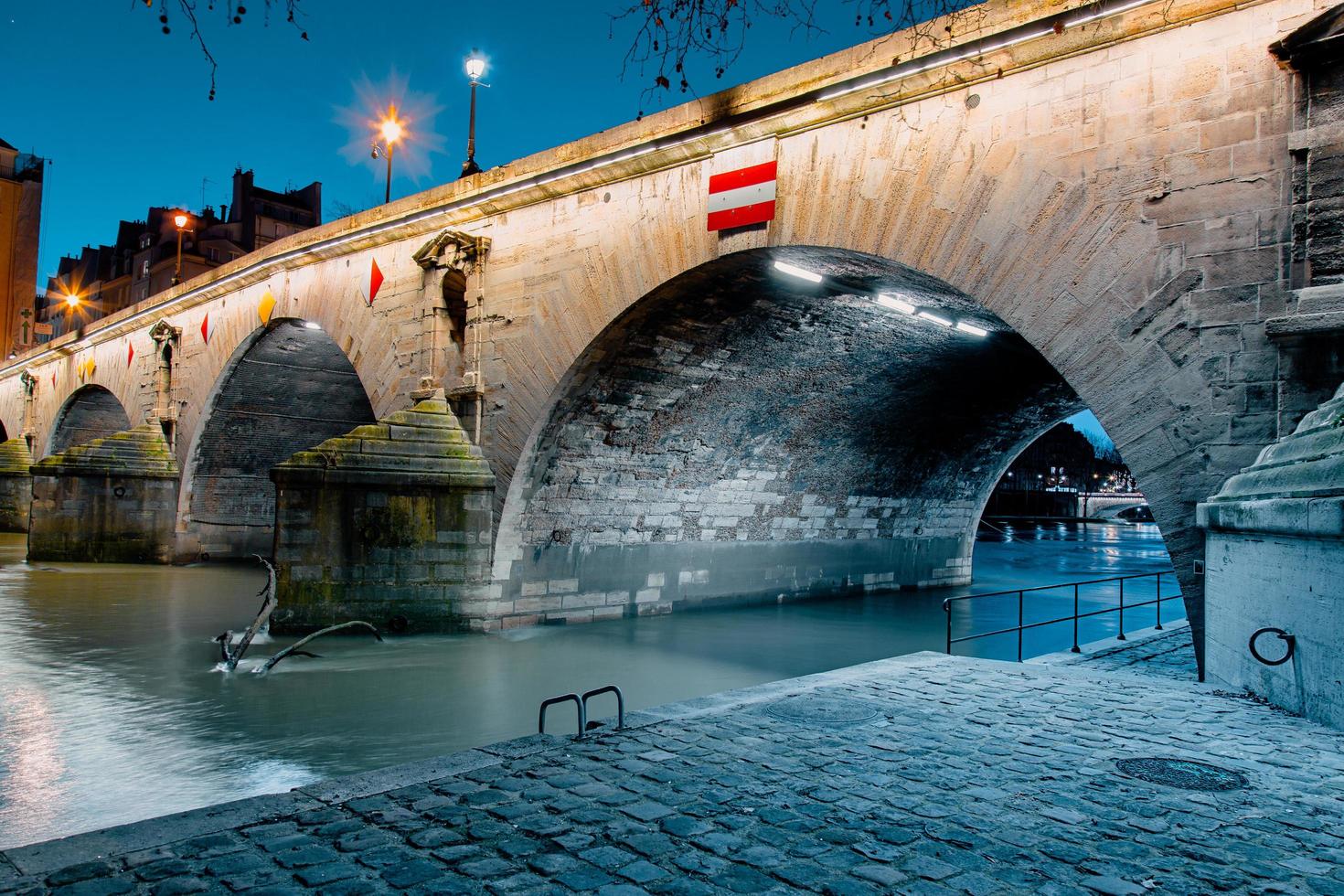 Twilight scene from Paris Seine River with fantastic colors during sunset. photo