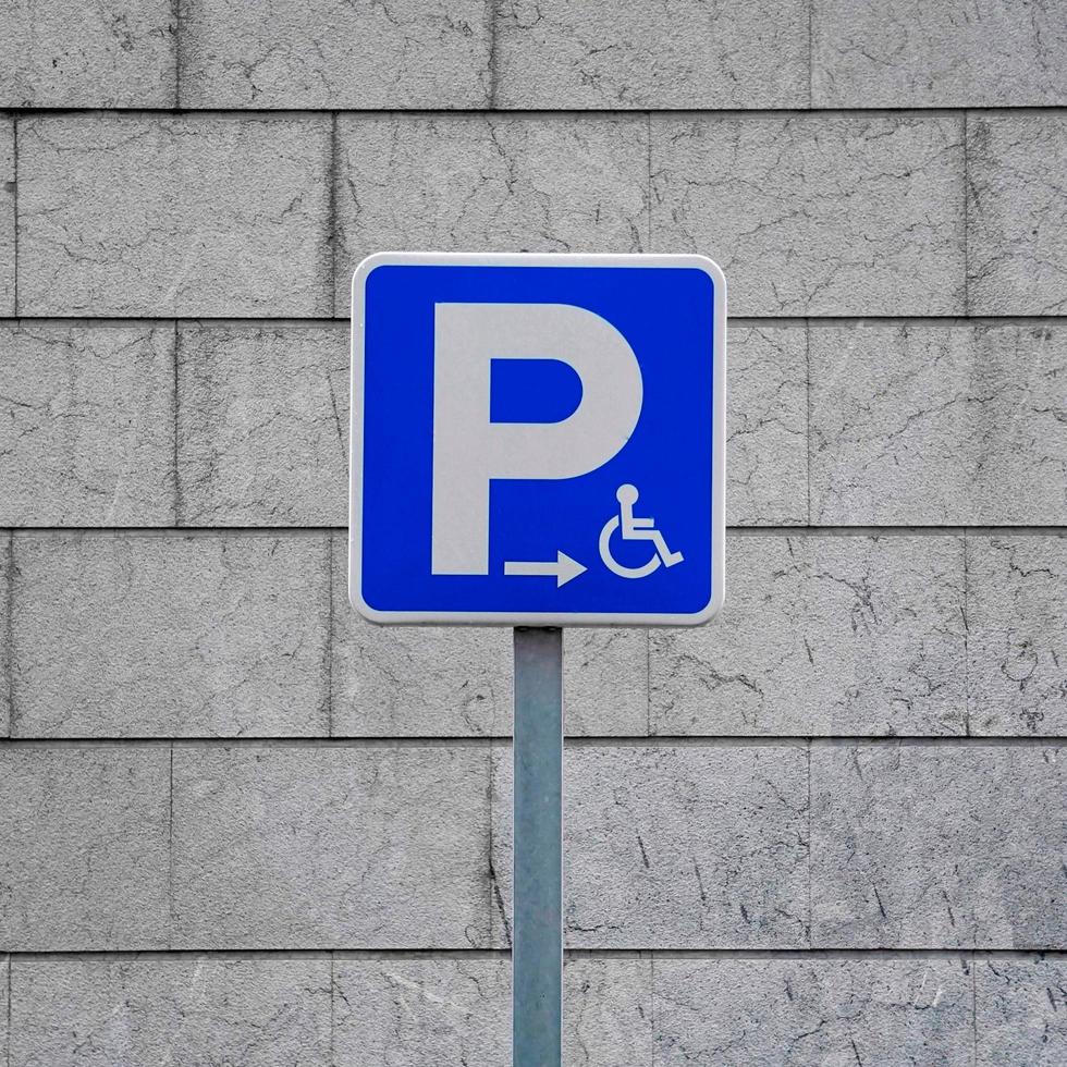 wheelchair traffic signal on the street photo