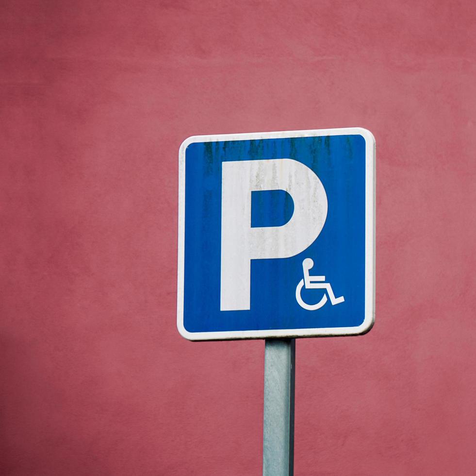 wheelchair traffic signal on the street photo