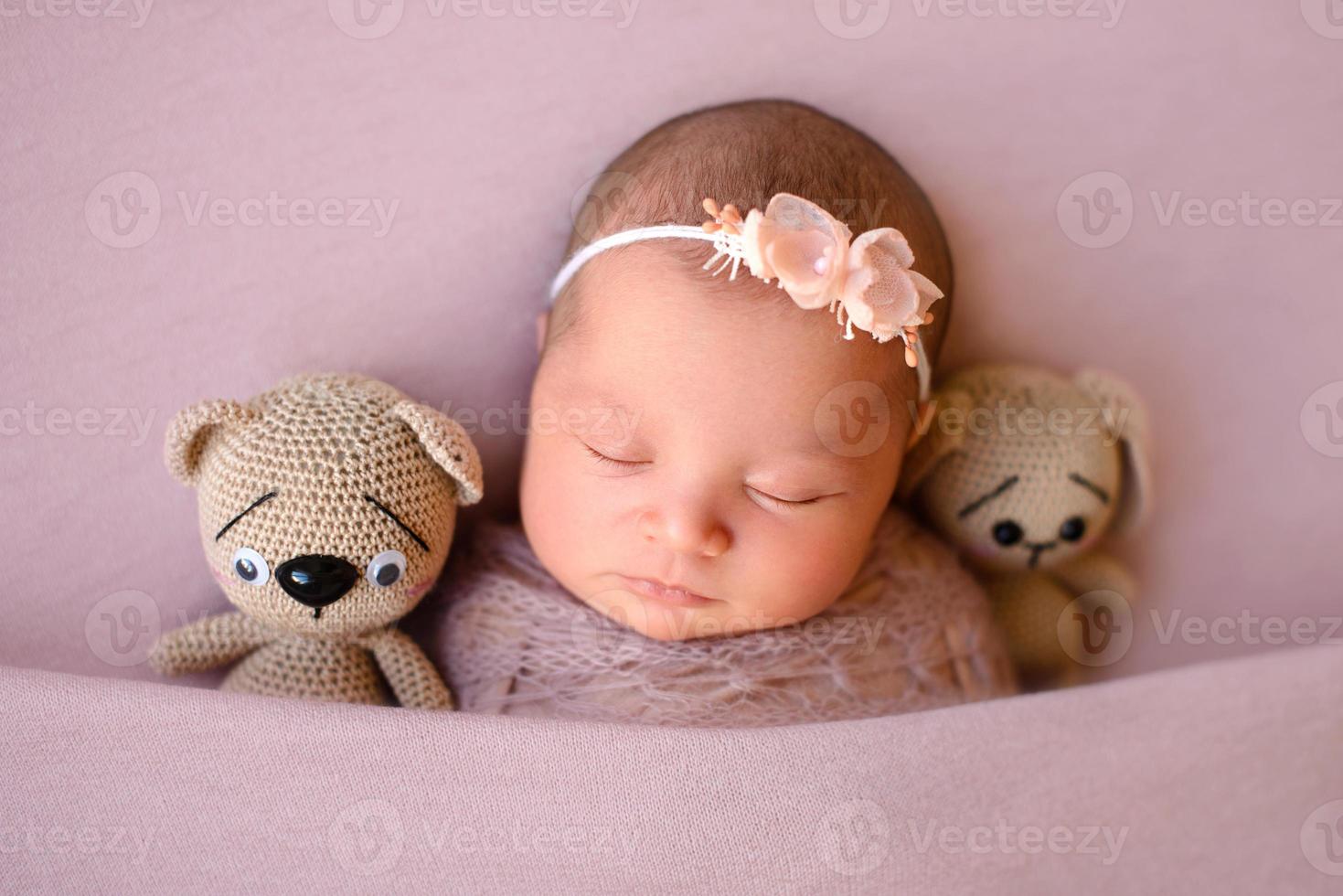 Close-up beautiful sleeping baby girl. Newborn baby girl, asleep photo