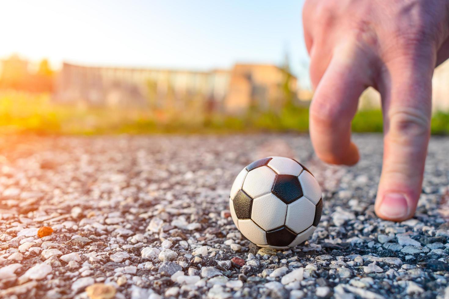 An impromptu finger football game with a souvenir ball photo