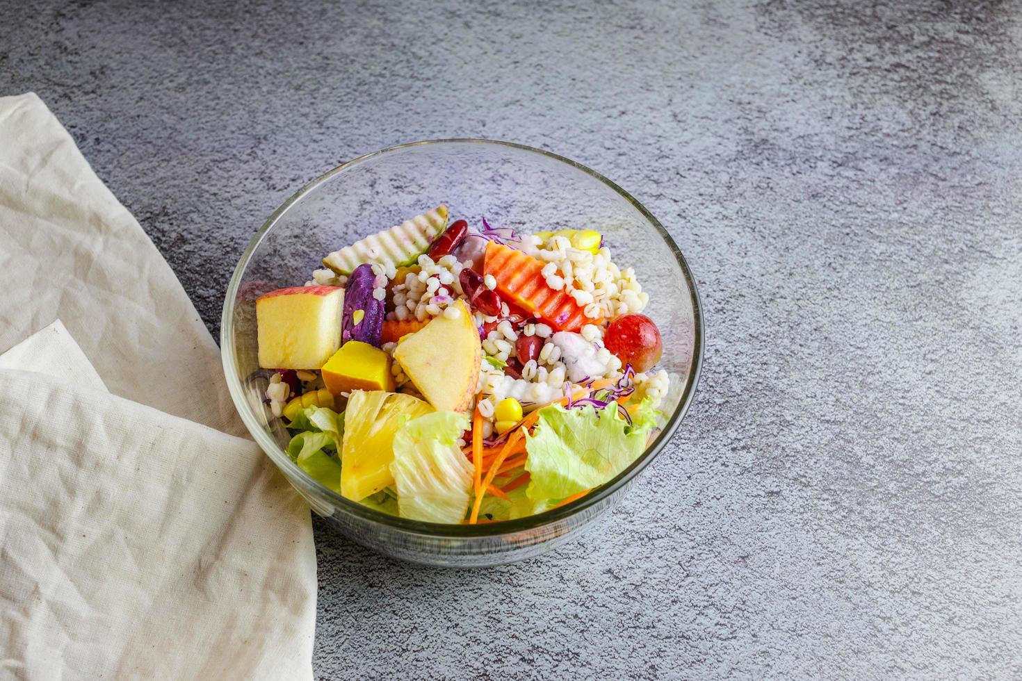 Healthy salad in a bowl on the table photo