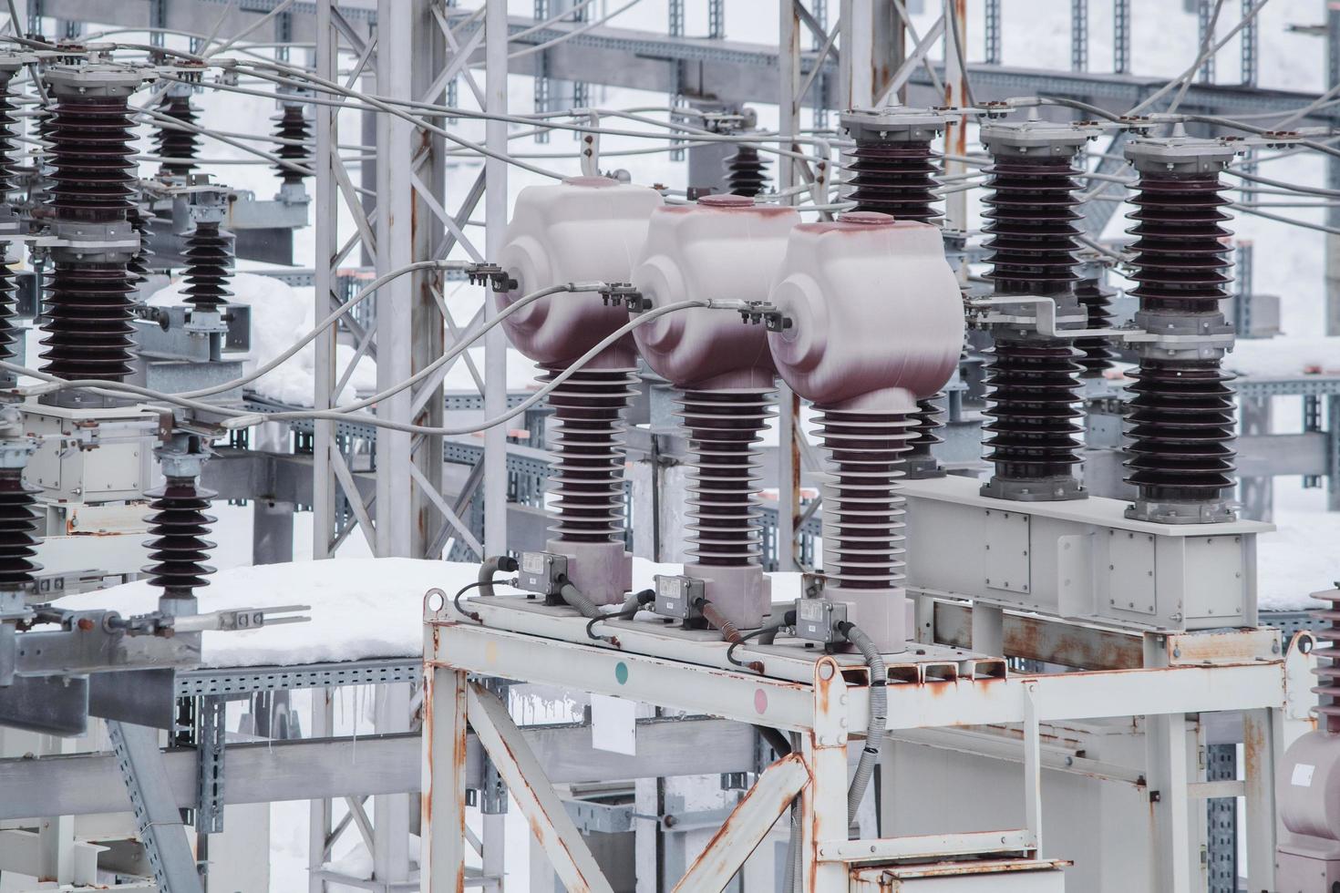 Measuring current transformers at a high-voltage substation. Electric power elements of urban infrastructure. photo