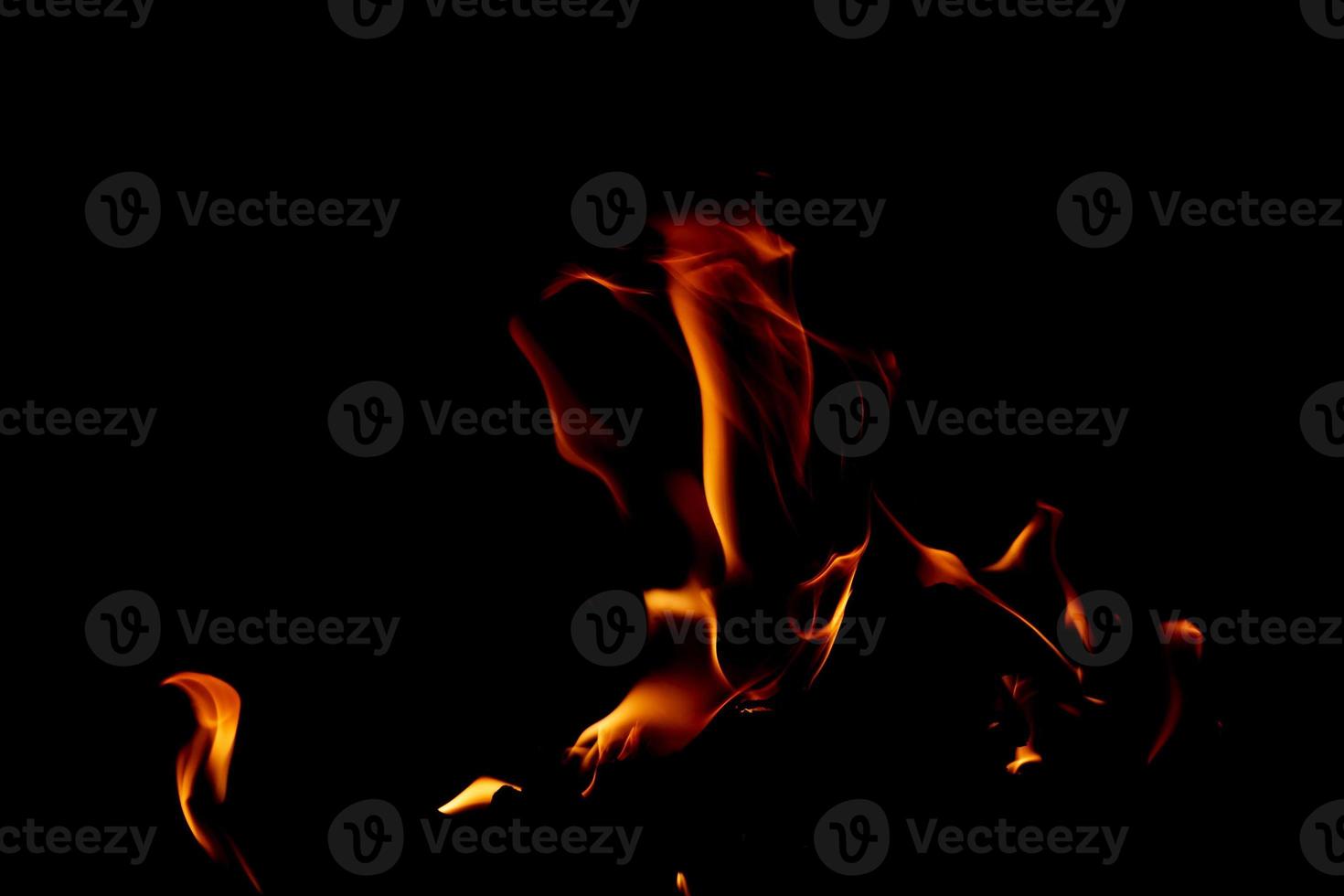 Fire flame texture. Burning material backdrop. Burn effect pattern. Blaze and torch wallpaper. Heat and haze backdrop. photo