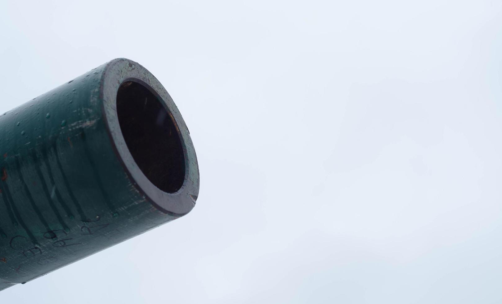 Edge of tank muzzle in cloudy day, close up. photo