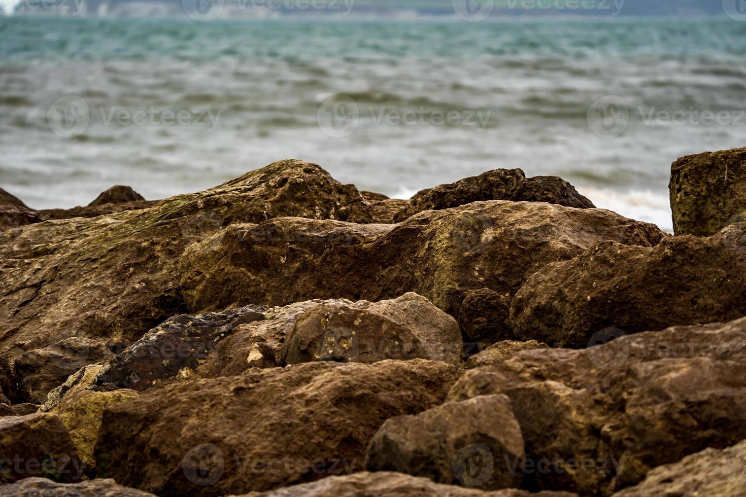 Rock Groin's With Sea In Background photo