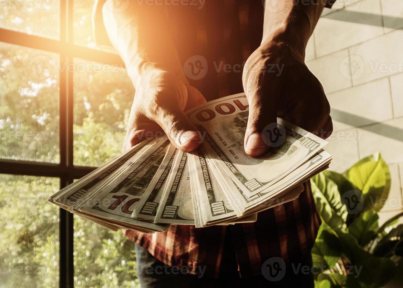 Picture of handing over banknotes. business investment concept and debt lending or bribery. photo