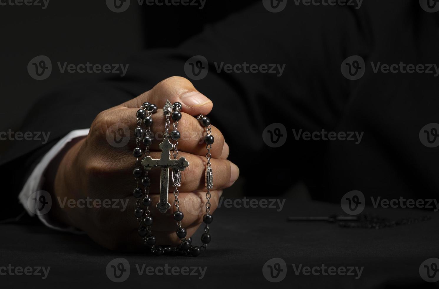 Intercession to God Because of faith and hope. The image of a hand with a cross photo