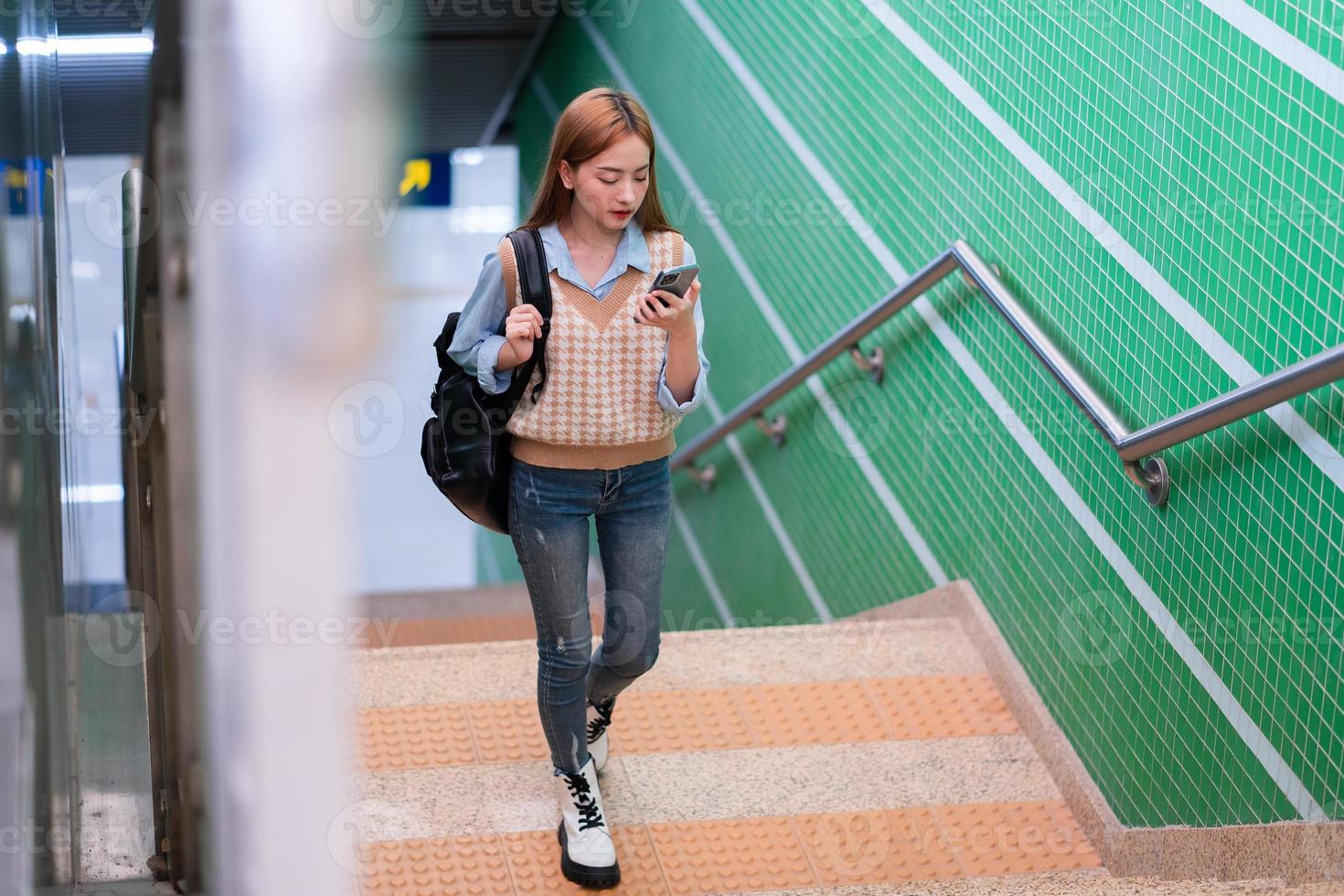 Young Asian business woman going to work photo