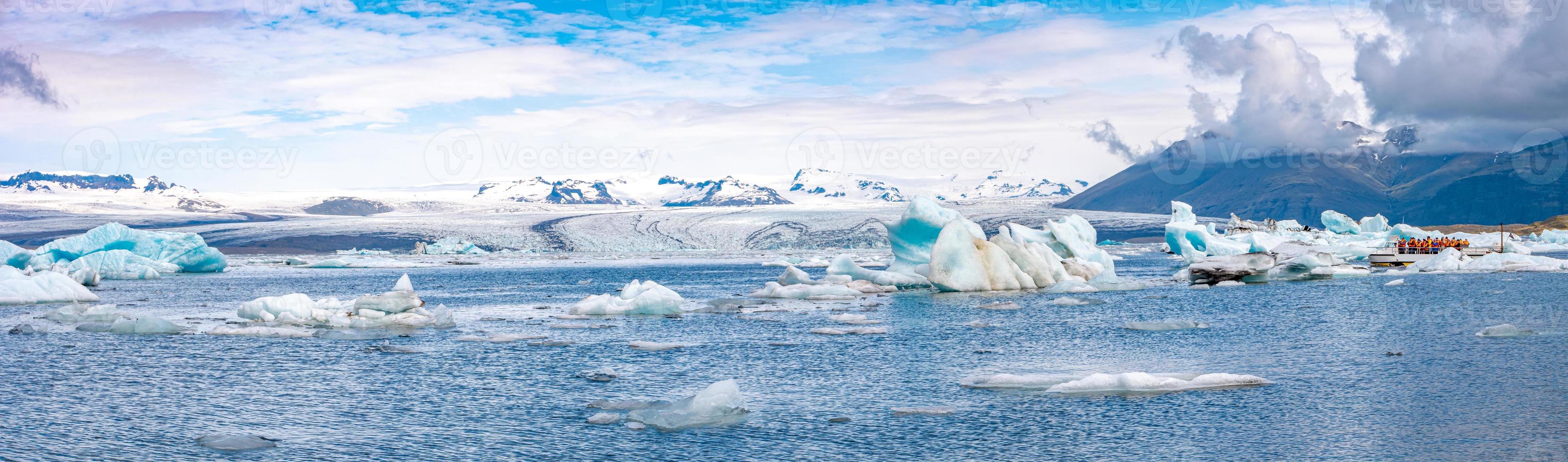 Panoramic view of Glacier Lagoon Jokulsarlon with icebergs and Vatnajokull Glacier tongue, Iceland, summer photo