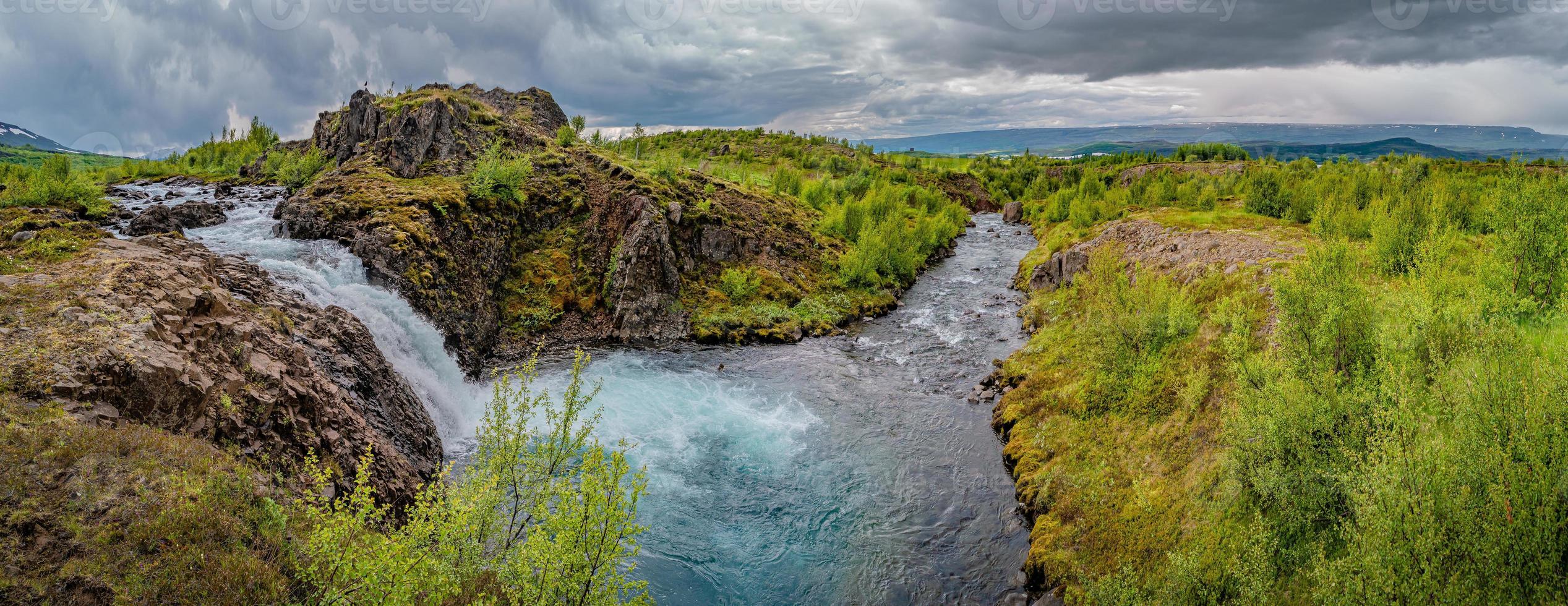 Panoramic view over wonderful and high waterfall Fardagafoss and its cascades near Egilsstadir on Eastern Iceland, summer. photo