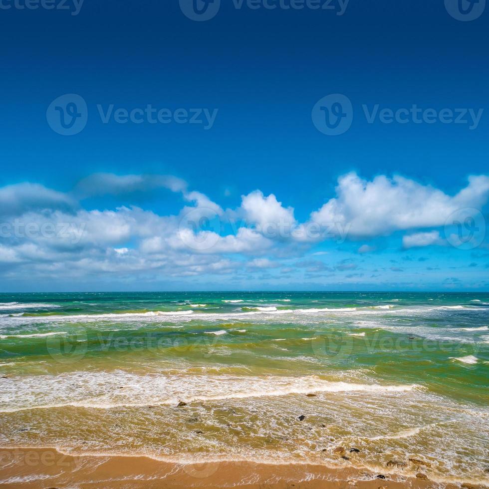 Cover page with oceanic seashore and sandy beach seascape at blue sky and gradient background with copy space photo
