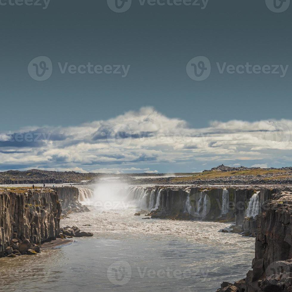 Wonderful waterfall Selfoss in Iceland, summer with copy space gradient background. photo
