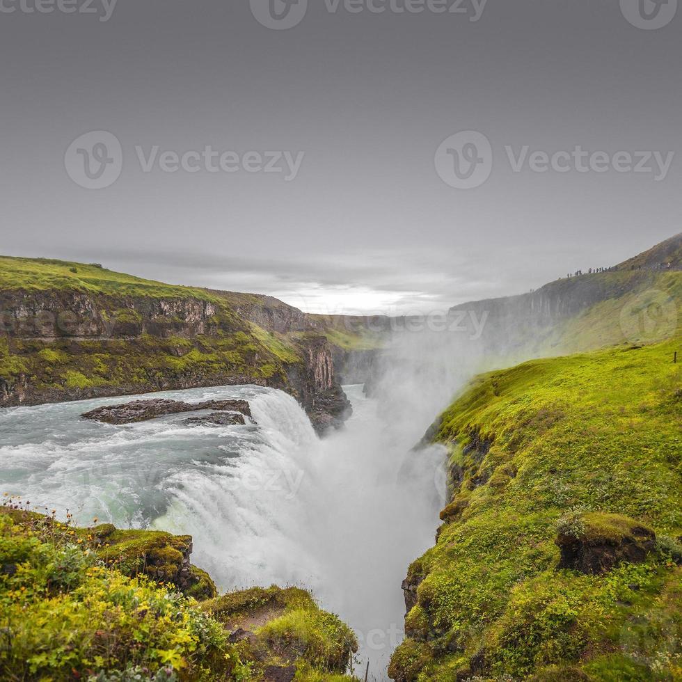 Wonderful waterfall Gullfoss in Iceland, summer, with copy space gradient background. photo