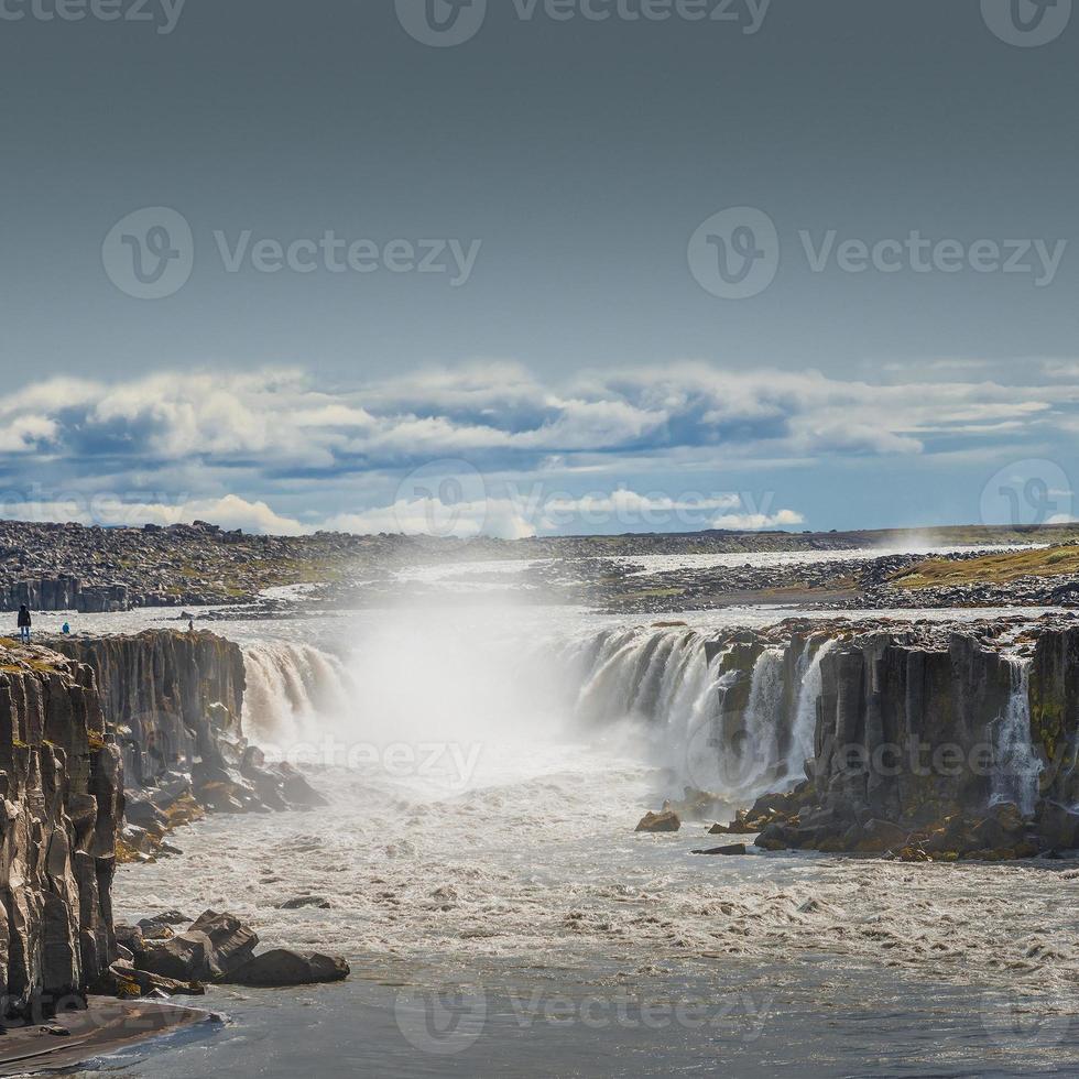 Wonderful waterfall Selfoss in Iceland, summer with copy space gradient background. photo