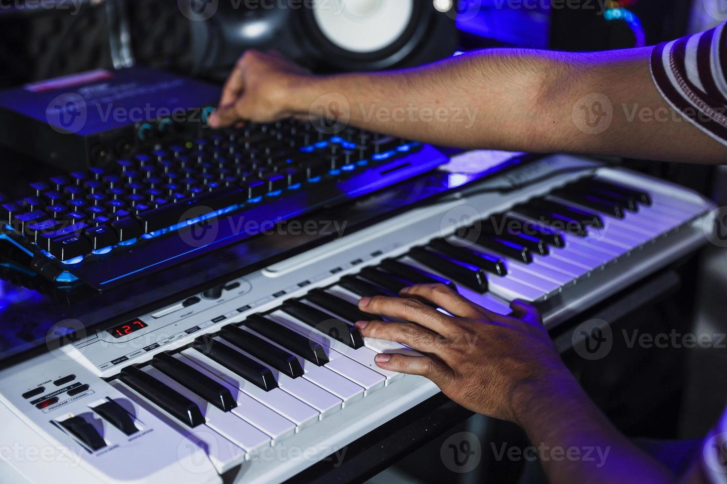 Piano players or composer working  in the recording studio photo