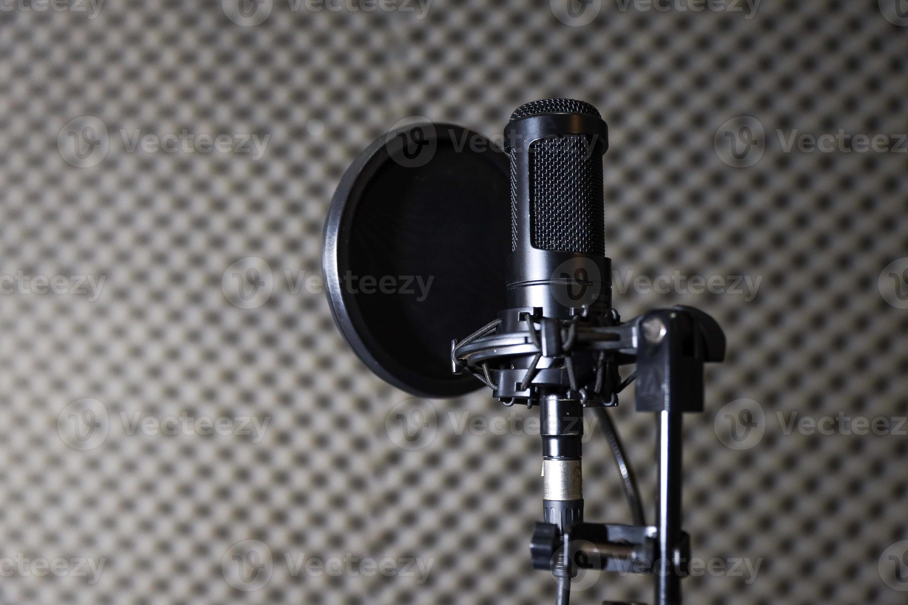 Microphones, condenser mic and mic stand with a recording studio background  6591729 Stock Photo at Vecteezy