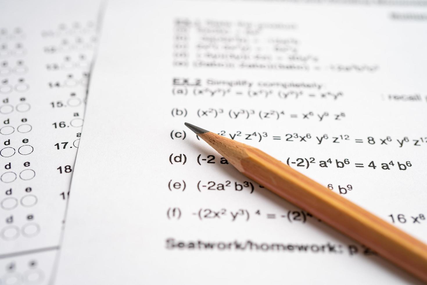 Answer sheets with pencil drawing fill to select choice, education concept photo