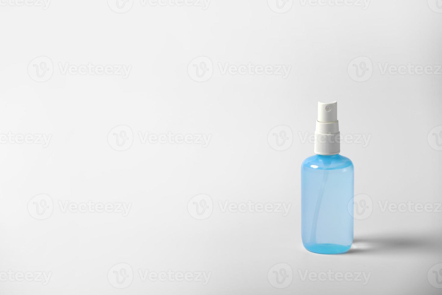 Clear hand sanitizer in a clear pump bottle isolated on a white background. Hand sanitizer is used for killing germs, bacteria and viruses. copy space. photo