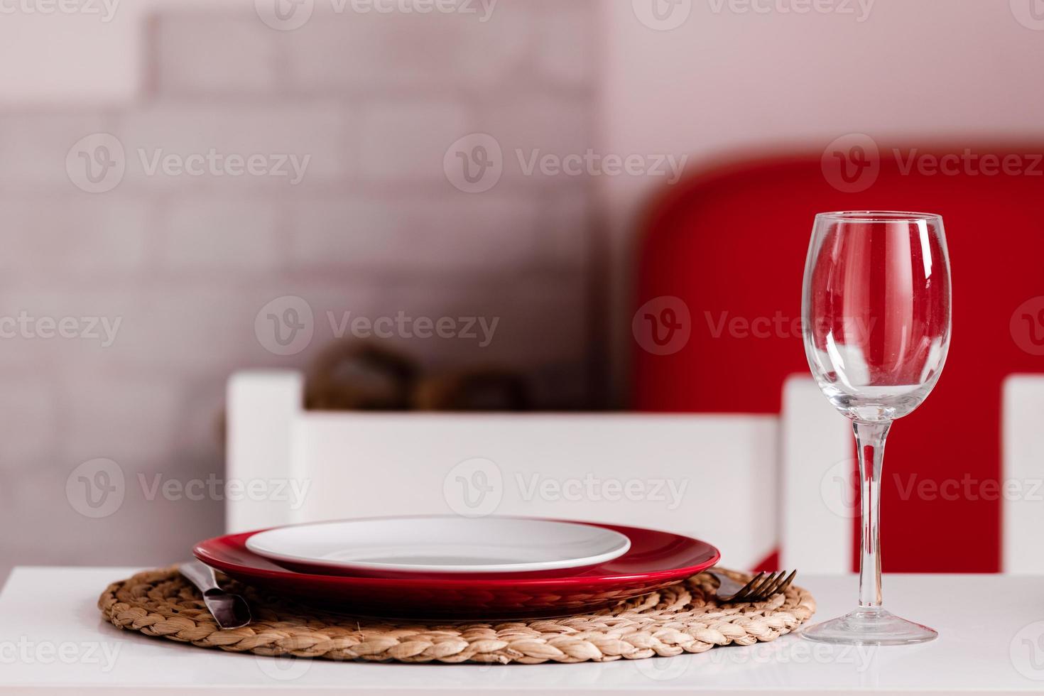 Romantic Dinner at home on the kitchen. Place setting for dinner date celebration wedding. photo
