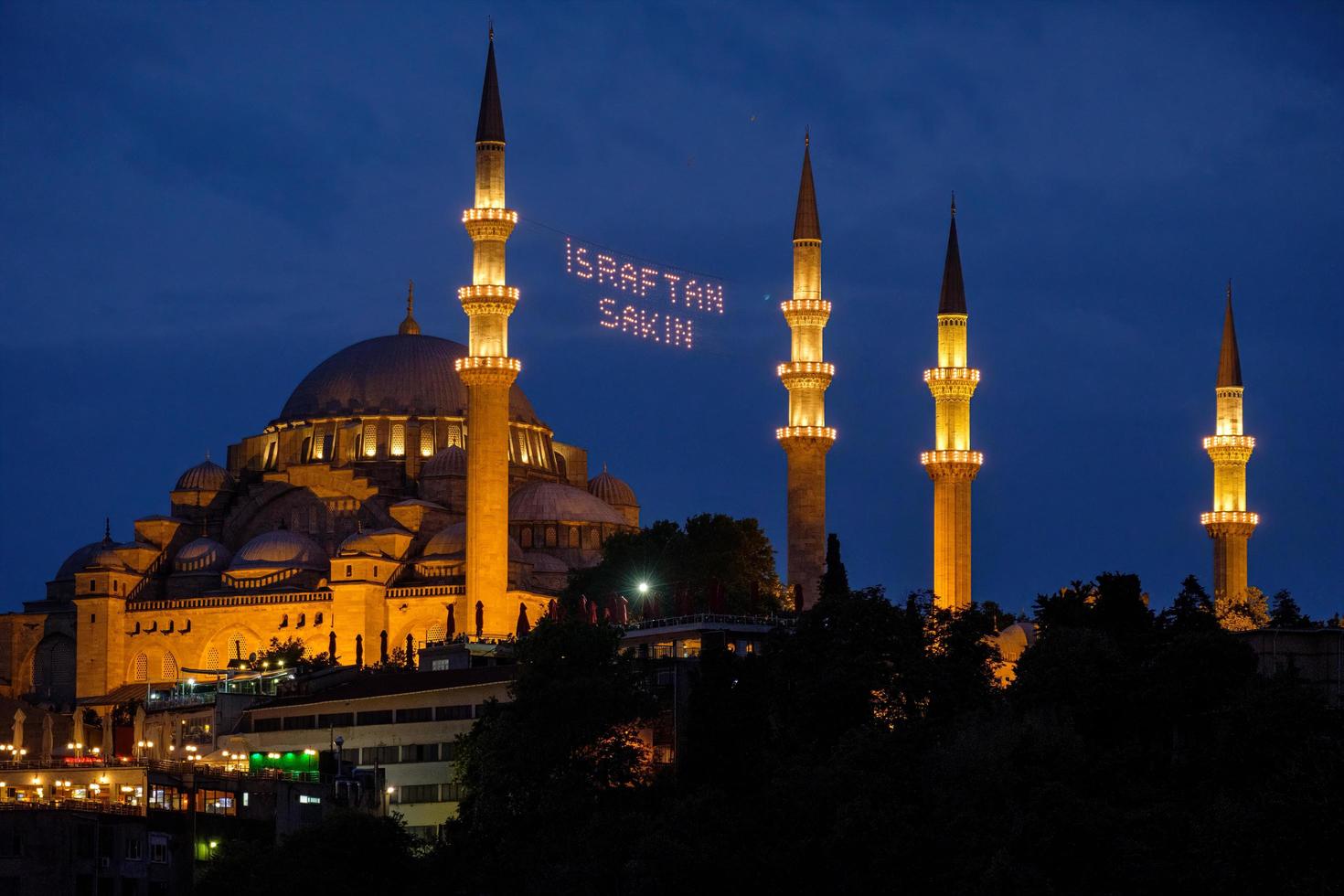 ISTANBUL, TURKEY, 2018  -  Night-time view of the Suleymaniye Mosque in Istanbul Turkey on May 98, 2018 photo
