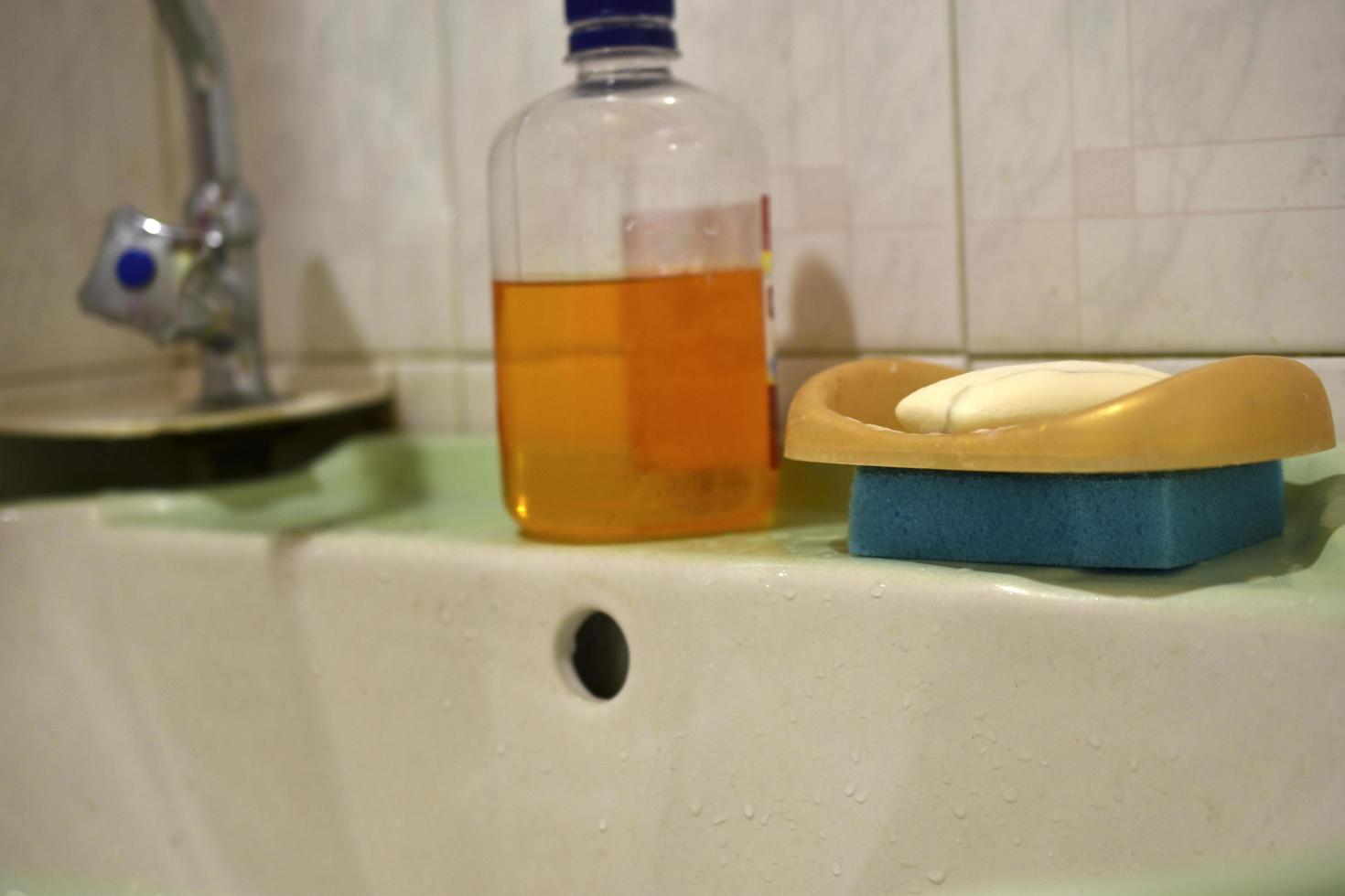 Soap and soap dish in the bathroom photo