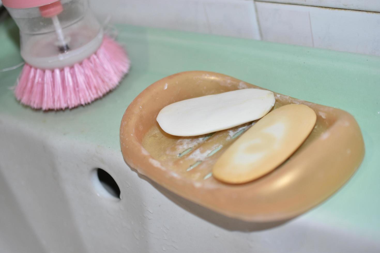 Soap and soap dish in the bathroom photo