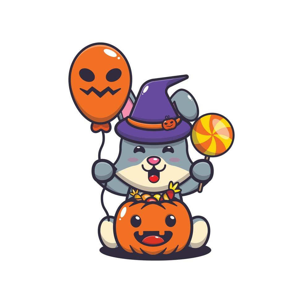 Cute rabbit wearing witch hat holding halloween balloon and candy vector