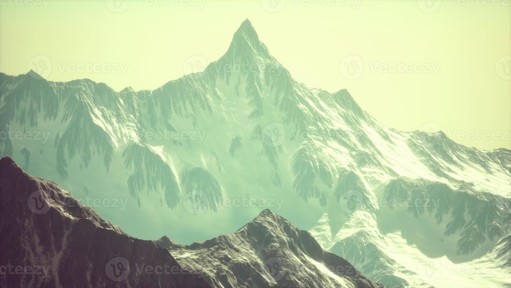 Panoramic view of the ski slope with the mountains photo