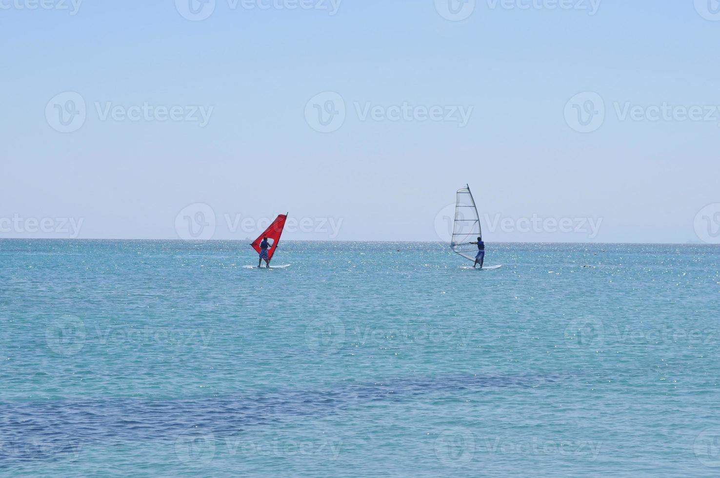 Wind surfing sport in the sea waves photo