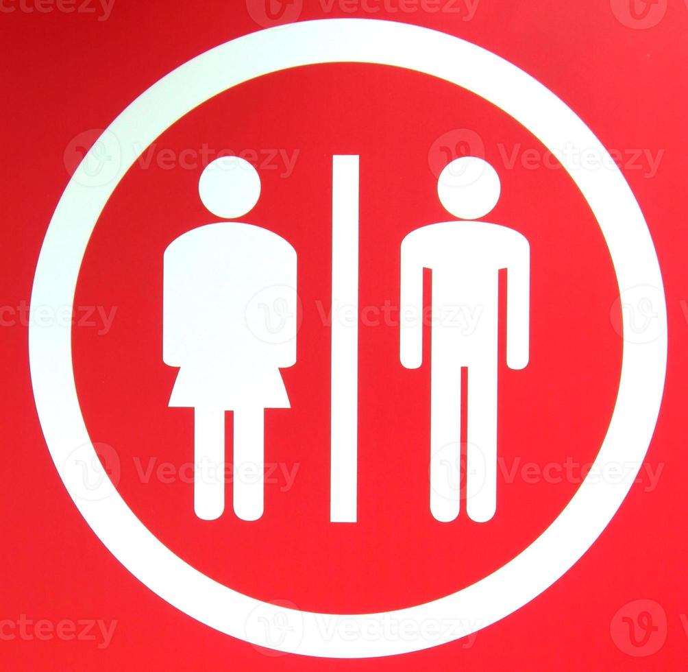 A toilet sign for ladies and gents photo
