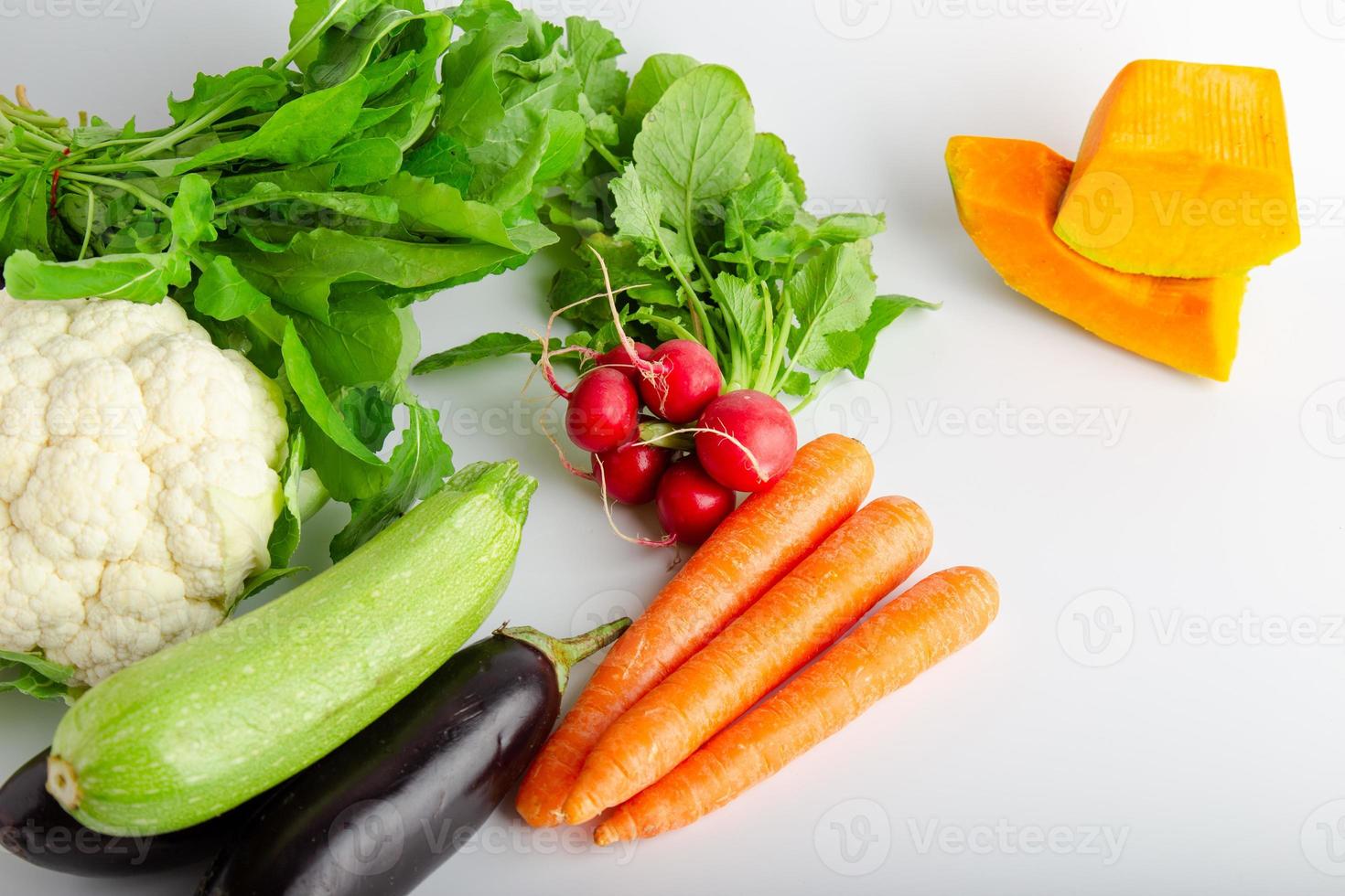 Isolated group of winter season vegetables over white. photo