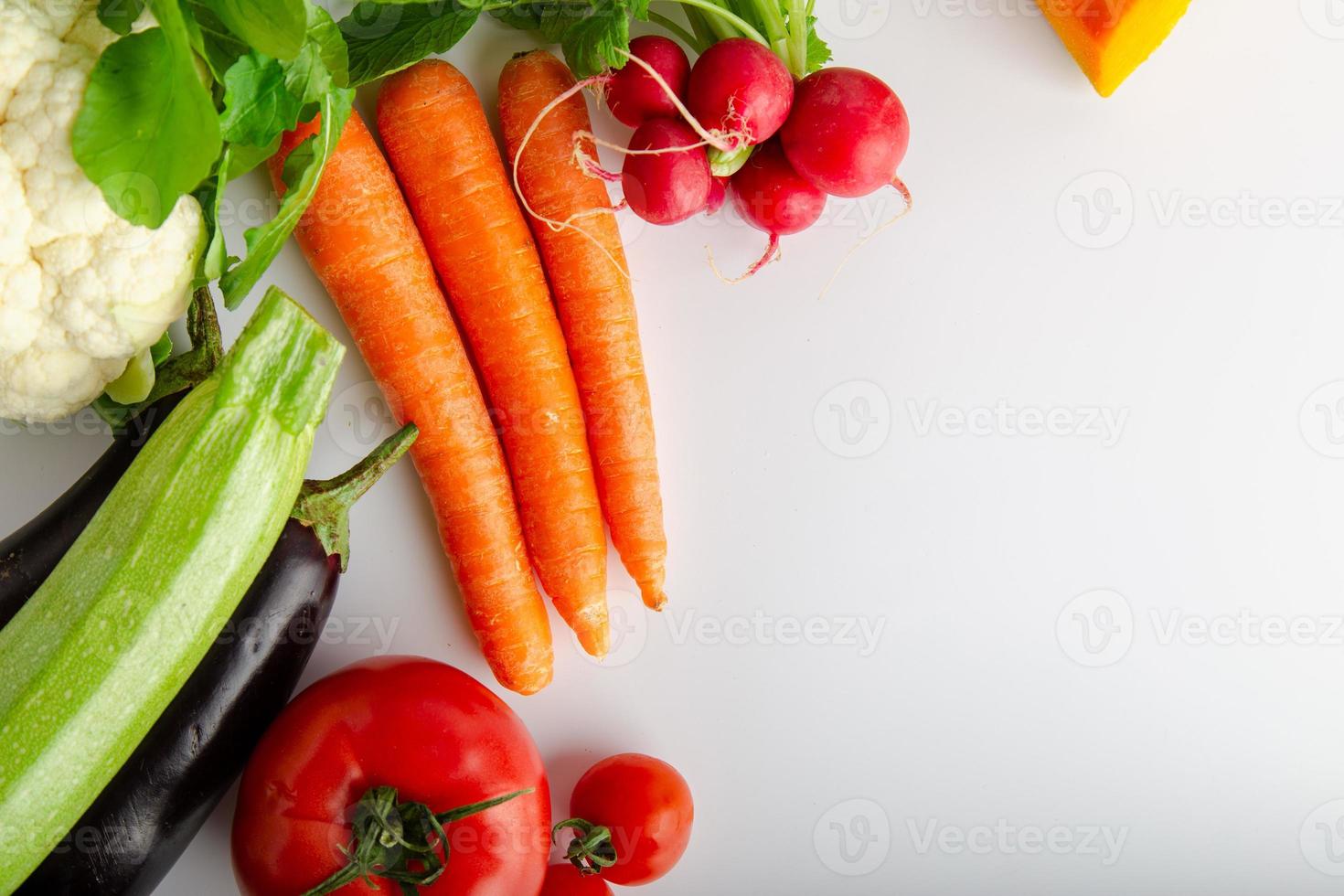 Isolated group of winter season vegetables over white flat lay view. Includes copy space. photo