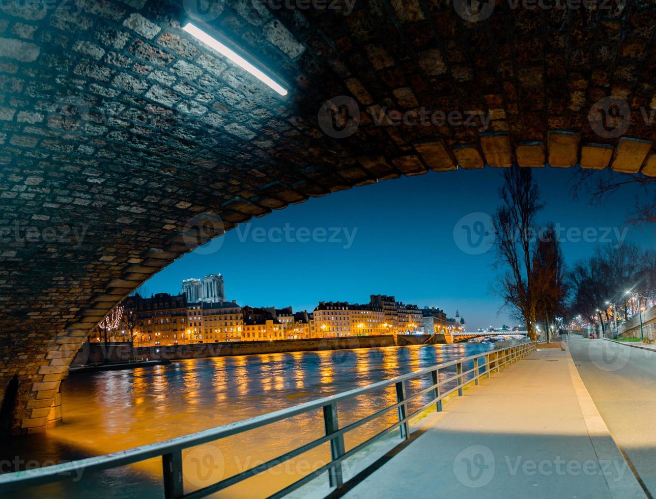 Twilight scene from Paris Seine River with fantastic colors during sunset. photo