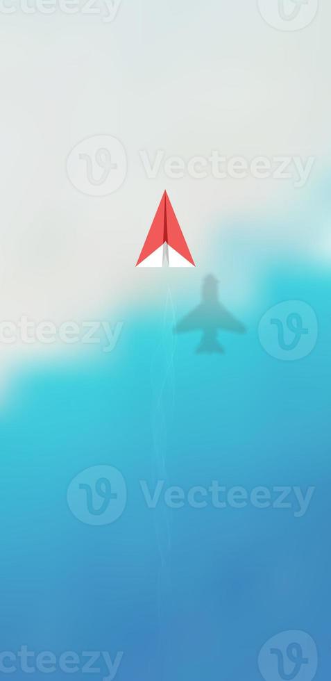 Top view of red origami paper airplane with realistic shadow on bokeh beach background. photo