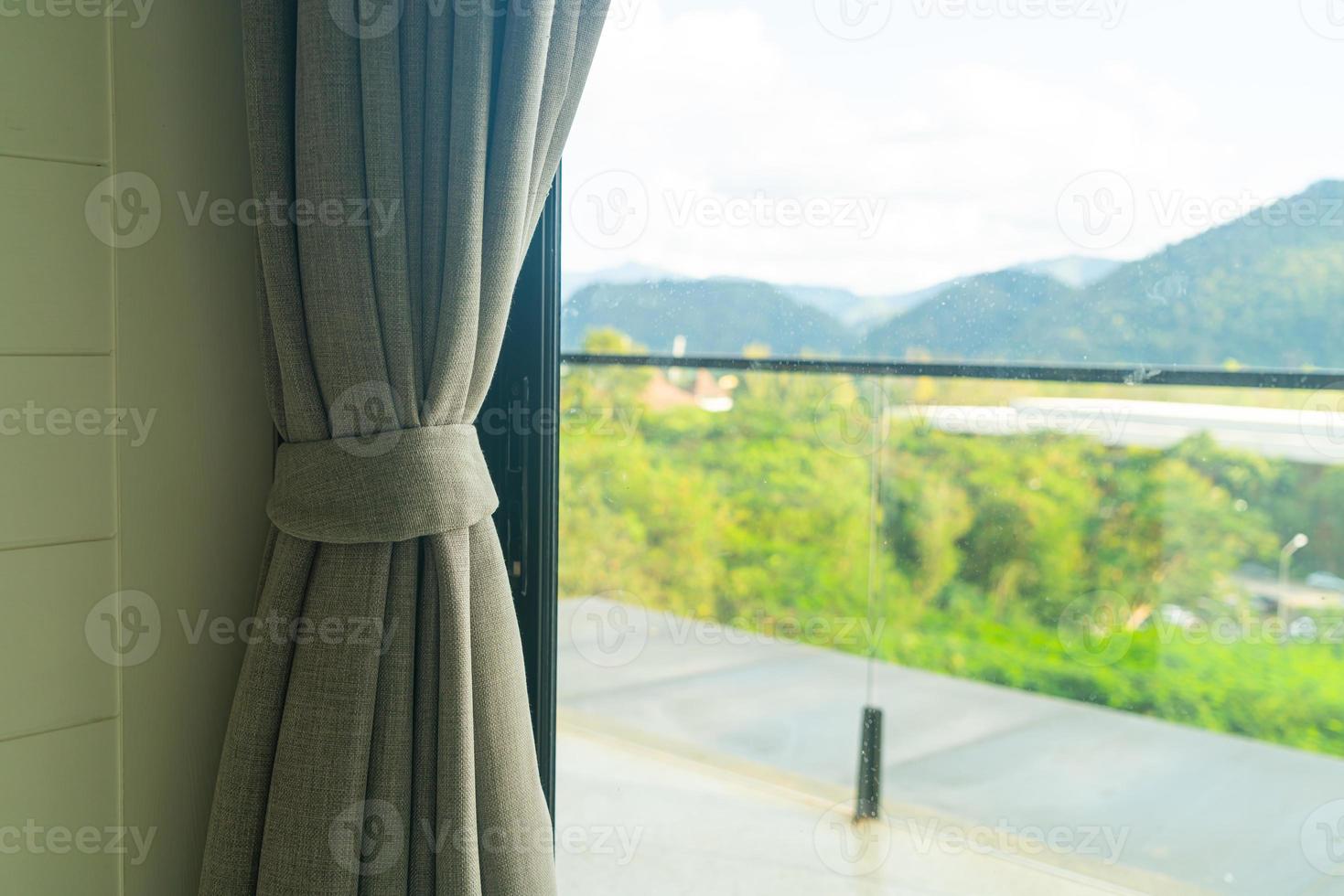 curtain with window and sunlight photo