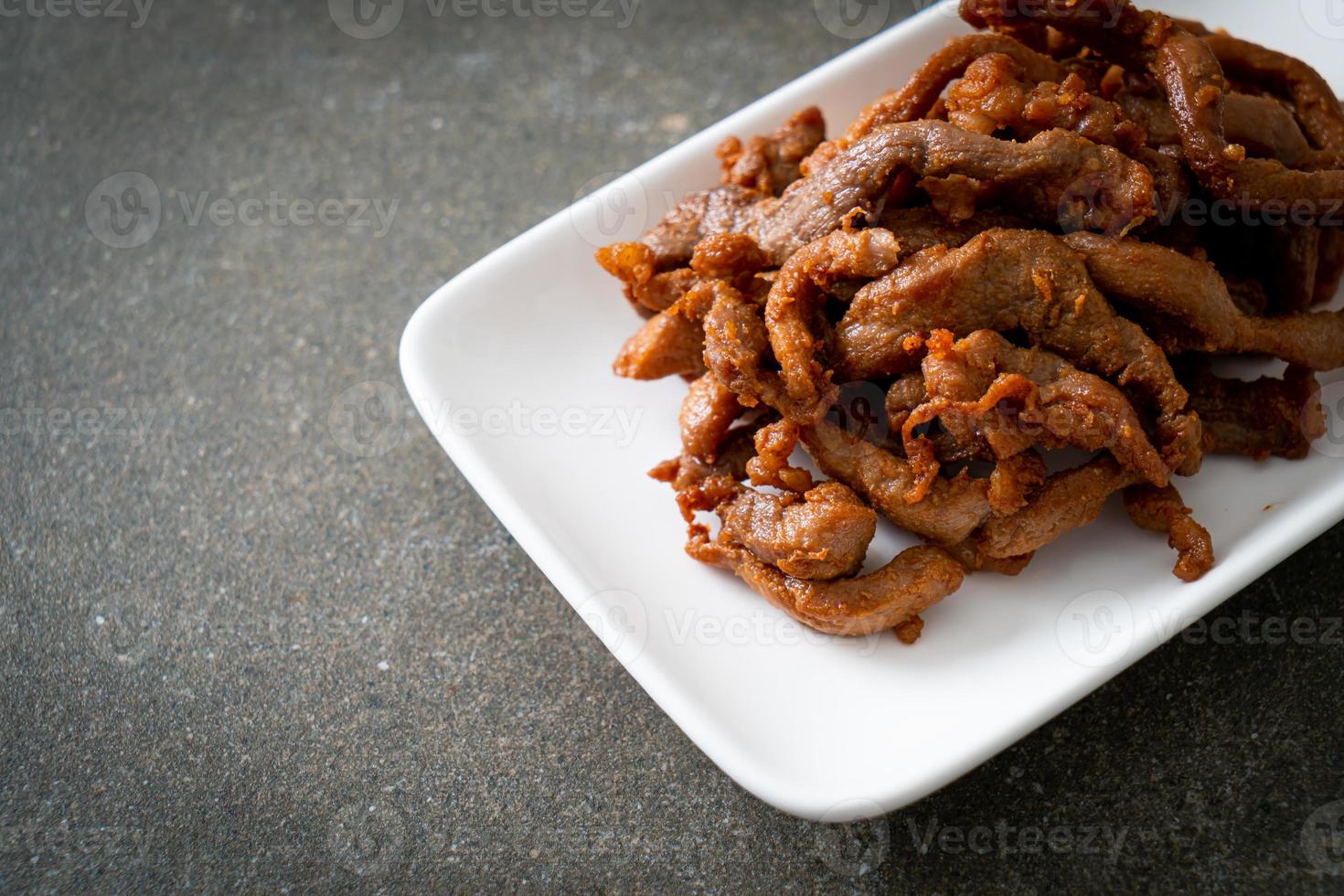 Sun-Dried Pork on white plate photo